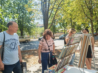 Летняя уличная акция «Книжные соблазны лета». ЦГ библиотека, Д.С. Костюк Летняя уличная акция «Книжные соблазны лета». ЦГ библиотека, Д.С. Костюк